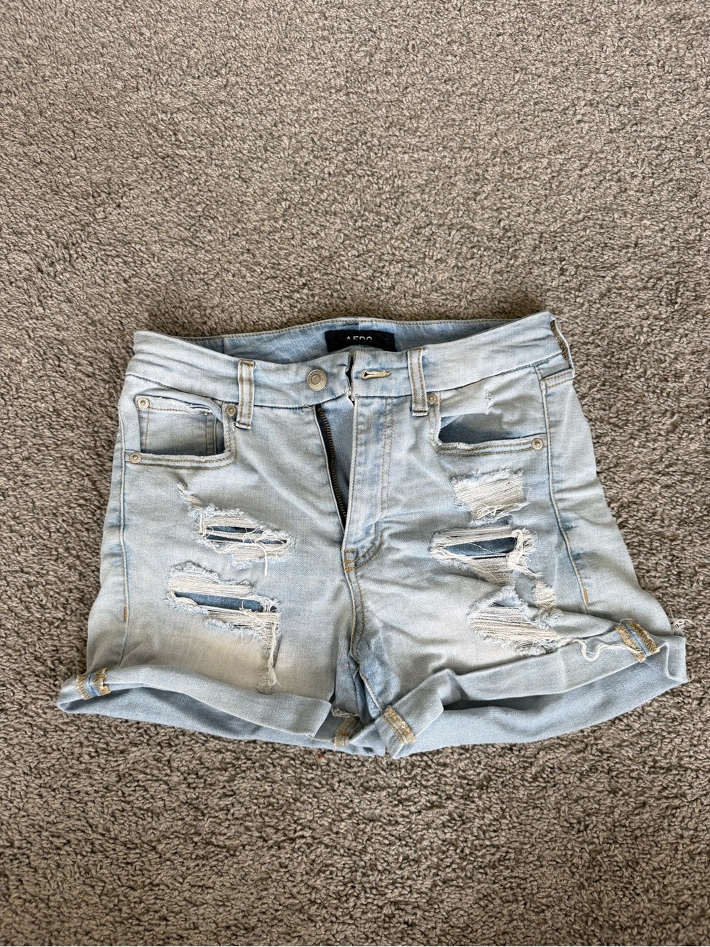 Light Wash Distressed Denim Shorts